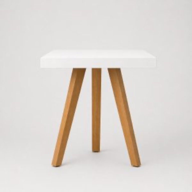 White and wood tripod cocktail table